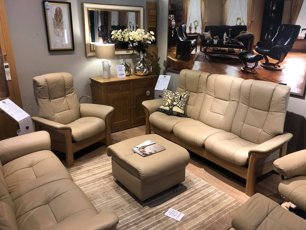 Stressless recliners and chairs suite on display in the Stressless Comfort Studio at Millichap's